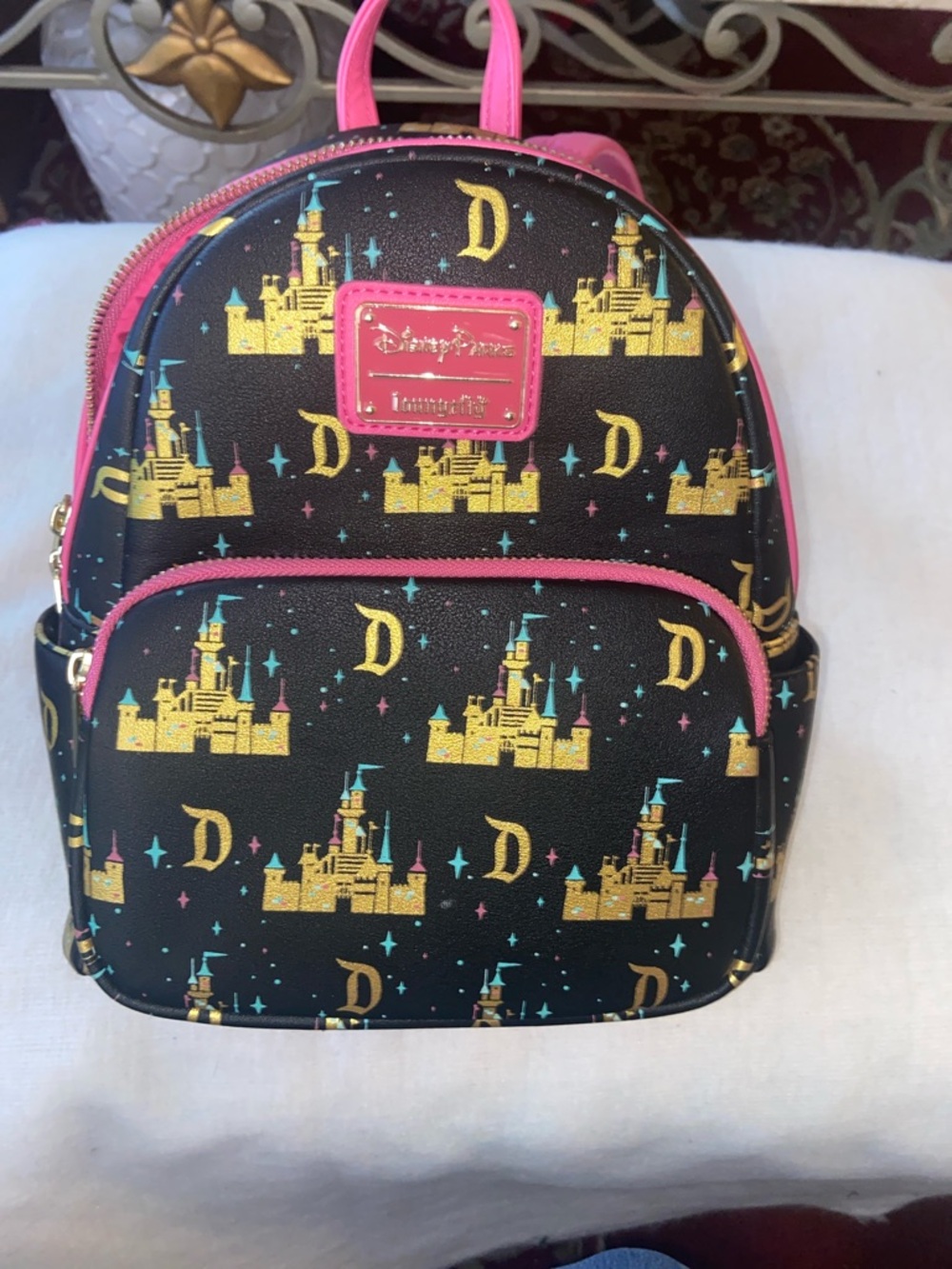 Loungefly Black Mini Backpack with Pink Trim and Gold Castle Print